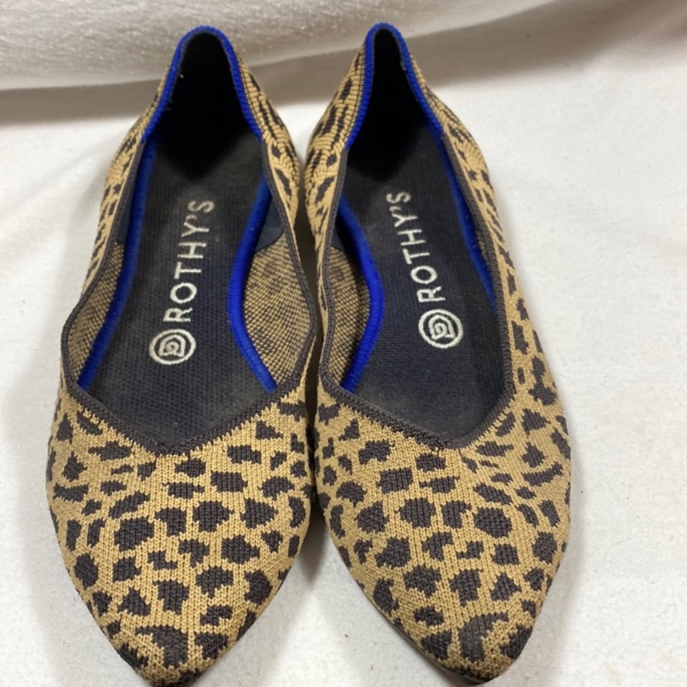 Rothy’s pointed toes animal print flats.